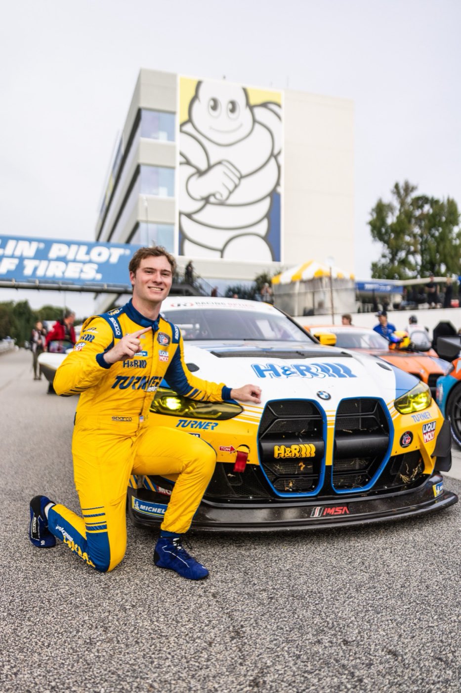 Francis Selldorff beside the BMW M4 GT4