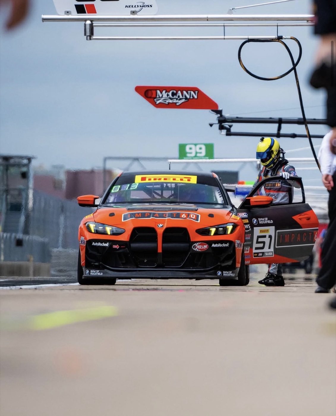 The #51 AutoTechnic Racing BMW M4 GT4 EVO in the pit lane
