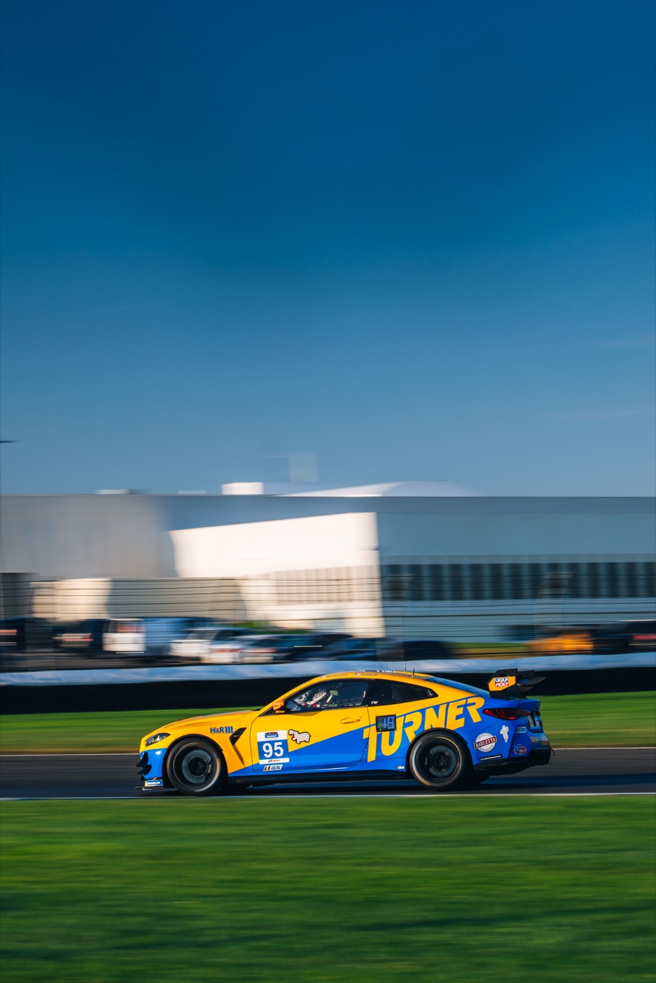 The #95 Turner BMW M4 GT4 at speed at Indianapolis